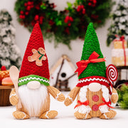 Christmas decoration gingerbread figurine glowing biscuit figurine red green pointed hat with light figurine